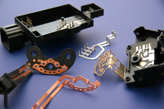 Electrical contacts for overmolding